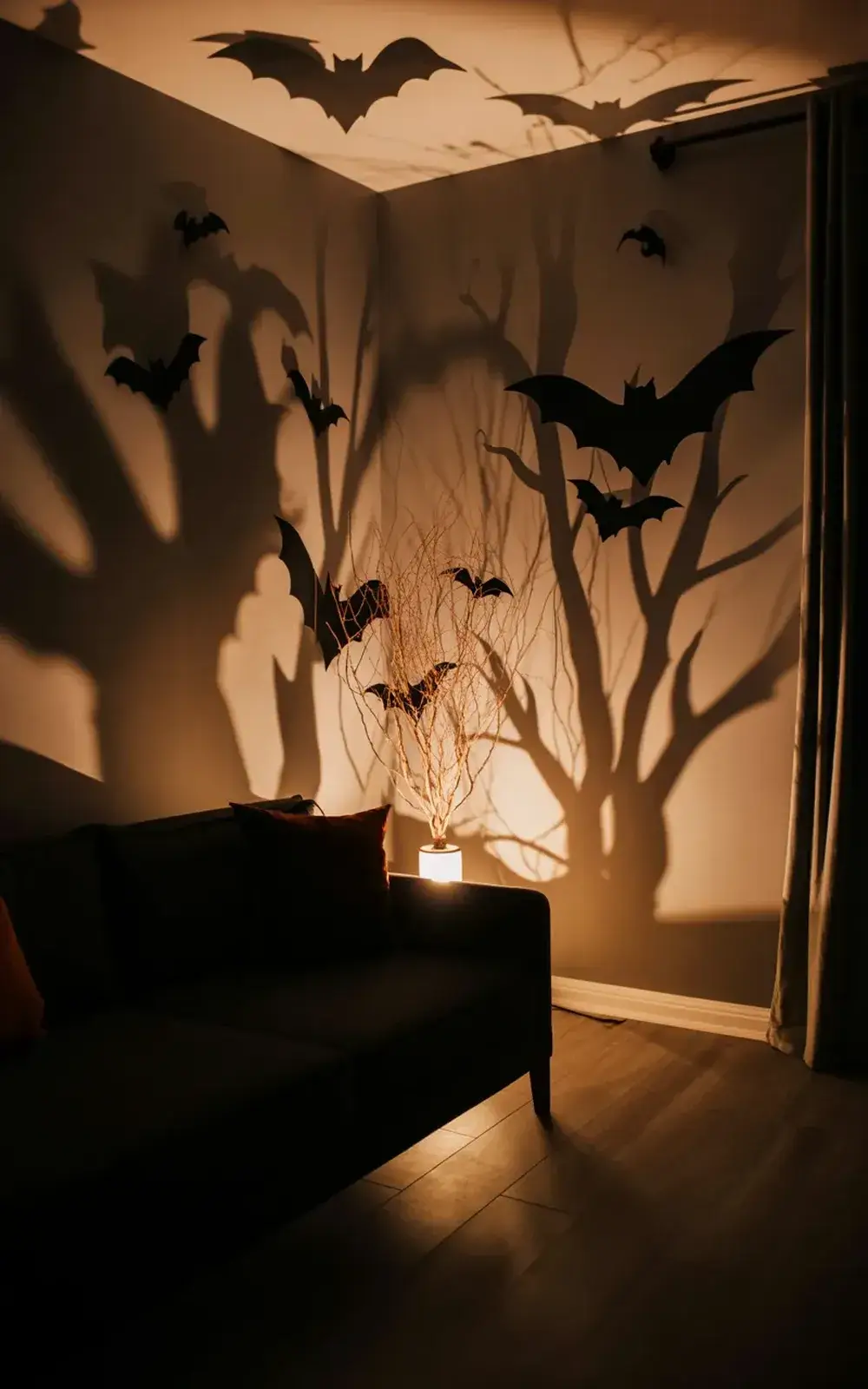 Bat and tree shadows projected on a paneled area in a dimly lit room.